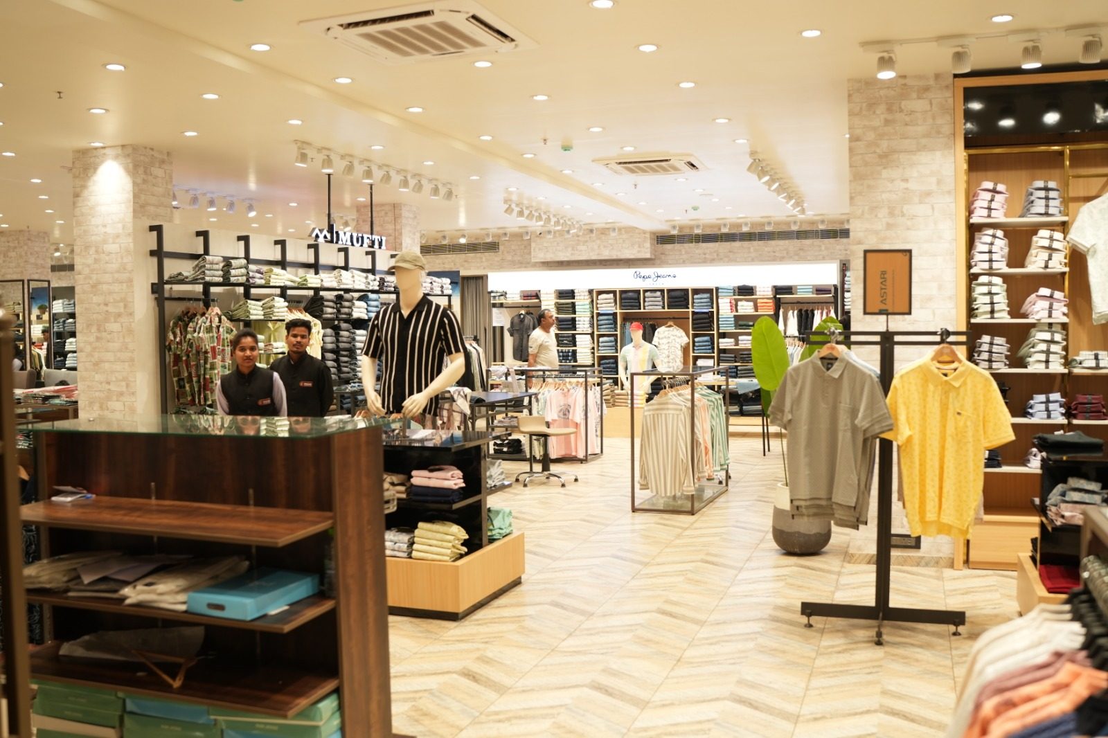 Men's fashion floor at Punjab Cloth Store with Mufti and Pepe Jeans sections